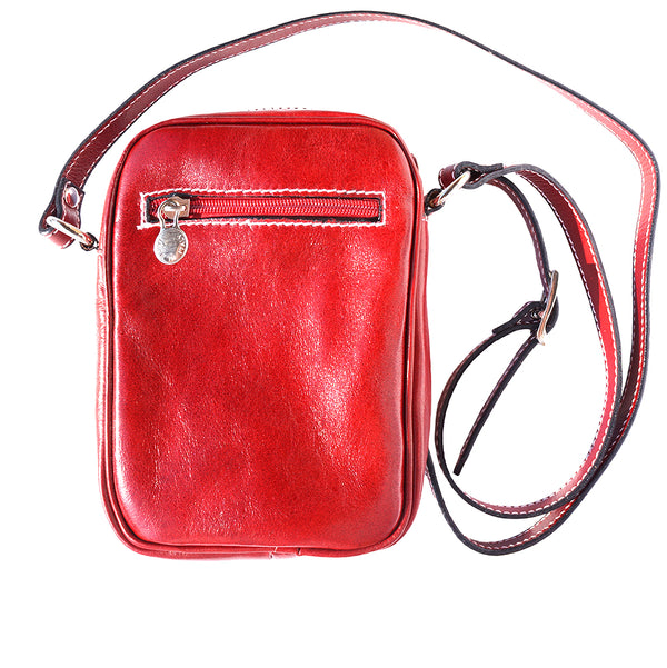 Small travel bag with shoulder strap made of genuine cowhide leather